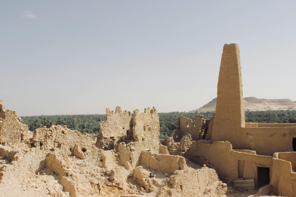 Explore the ancient ruins of an oracle temple amidst Egypt's arid landscape in Matrouh Governorate.